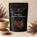 Orvianco Rooibos Heather Wilderness in black pouch with rooibos tea